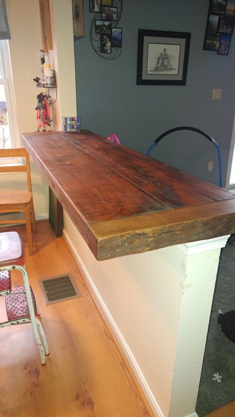 Our Half wall turned into a bar! Reclaimed wood bar top! Turn Half Wall Into Breakfast Bar, Halfwall Shelf, Pony Wall Bar Top, Half Wall Shelf Ideas, Half Wall Breakfast Bar, Half Wall Topper Ideas, Half Wall Countertop Bar, Wood Bar Top Ideas, Half Wall Bar Top