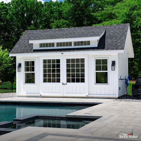 Our sheds aren't just for storage—this customer turned their 12' x 18' Victorian Carriage House into an upscale pool house. Take a look at our recent blog post for more photos of the exterior and interior. #thebarnyard #thebarnyardstore #worldsbestsheds #barnyardsheds #victorianshed #victoriancarriagehouse #carriagehouse #poolhouse #summer #pool #swimming #shed #sheds #shedgoals #tby70847 Pool House Office Combo, White Carriage House, Carriage House Pool House, Pool Building, Pool House Shed Ideas, Tuff Shed Pool House, She Shed Pool House, Garage With Pool House On Back, Pool House Garage Combo Farmhouse