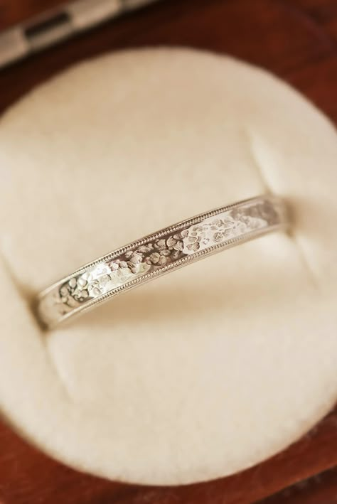 This ring style has been popular lately. It features a gorgeous but rustic hand-textured surface and bordered with a vintage inspired milgrain detail. A wedding band style like this piece is a great option if you're wanting something that has a little bit of texture and a more masculine feel, but you still want something refined and timeless. The textured surface and vintage milgrain that is then bordered by a polished smooth edge is equal parts rustic and modern. Plain Gold Wedding Bands, Gold Wedding Band Women, Solid Gold Wedding Band, Wide Wedding Rings, Filigree Wedding Ring, Word Ring, Gold Wedding Bands Women, Wedding Band Vintage, Wedding Band Women