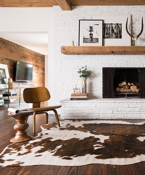 Southwestern Area Rugs | Farmhouse, Western  Rustic Rug Collection Faux Cowhide Rug, Alexander Home, Faux Cowhide, Western Homes, Hide Rug, Western Home Decor, Brick Fireplace, Cow Hide Rug, Cow Hide