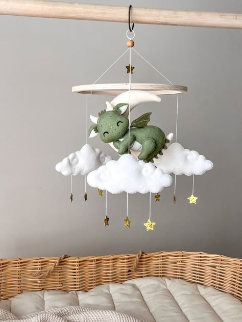 This Mobiles item by Aswanaya has 68 favorites from Etsy shoppers. Ships from Belgium. Listed on Jul 24, 2024 Dragon Mobile Baby, Fairytale Theme Nursery, D&d Nursery, Fun Nursery Themes, Baby Room Ideas Colorful, Magical Nursery Theme, Baby Dragon Nursery, Pond Nursery Theme, Hobbit Nursery Theme