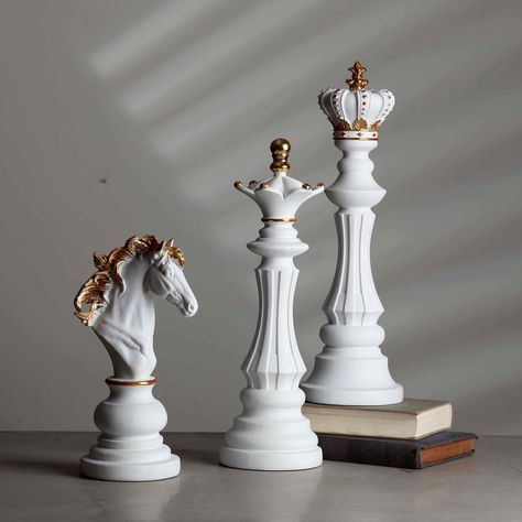 Hello,  Welcome toCosmos Art Atelier Package Content: Set of 3 Chess  Pieces/White Color 1 pc King 1pc Queen 1pc Knight Made of high quality resin material and  painted in our Art Atelier.  Dimensions; King: 40cm x 12.5cm 15.7'' x 4.9'' Queen: 37cm x 12cm 14.5'' x 4.7'' Knight: 27cm x 14.2cm 10.6 x 5.5'' In Black colours, this type of statue will fit perfectly into your décor. This cheap statue can even take place in your outdoor space, in the middle of the greenery, to bring a modern and origin Queen Knight, King Chess Piece, Large Chess Set, Knight Chess, Queen Chess Piece, Art Atelier, Chess Queen, Resin Sculpture, Chess Game