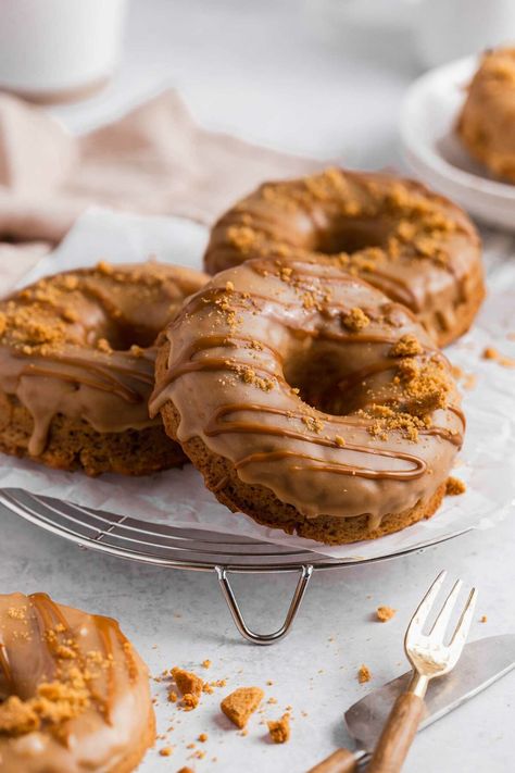 Indulge in the irresistible magic of these vegan Biscoff doughnuts! These baked doughnuts are the perfect blend of fluffy and moist, sweet with full of biscoff flavour, and the luscious biscoff glaze adds extra decadence to the doughnuts. Whether it's breakfast or dessert, elevate your day with this easy, fool-proof recipe that's as fun to make as it is to eat! Ideal for gatherings like home parties or a sweet personal treat. Vegan Biscoff Recipes, Pastry Photography, Biscoff Recipes, Baked Doughnuts, Home Parties, Fool Proof, Fool Proof Recipes, Vegan Baking, Easy Vegan