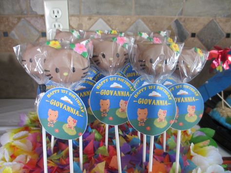 Hawaiian Hello Kitty cake pops by IRIE CAKES delicious Hawaiian Hello Kitty Birthday, Hawaiian Sanrio, Hello Kitty Luau Birthday, Tropical Core Hello Kitty, Hawaiian Hello Kitty, Hello Kitty In Hawaii, Hawaiian Hello Kitty Plush, Hello Party, Hello Kitty Birthday Theme