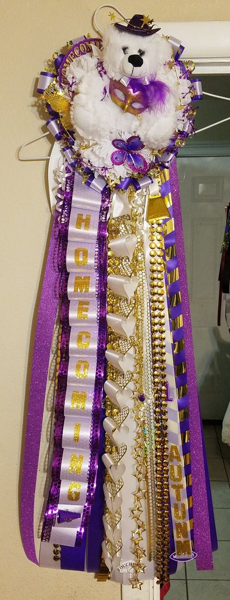 Purple And Gold Homecoming Mums, Two Flower Homecoming Mums, Purple Gold And White Homecoming Mums, Football Garter, Triple Homecoming Mum Backer, Homecoming Spirit Week, Chain Braid, White Mums, Military Braid Homecoming Mums