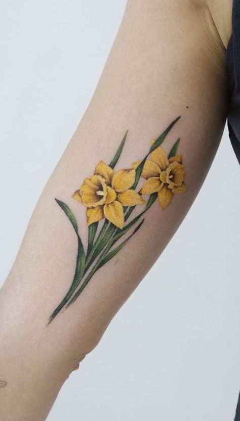 Daffodil Color Tattoo, Easter Flower Tattoo, Daffodil Tattoo Birth Flower, Daffodil Tattoo Design Drawings, Welsh Daffodil Tattoo, Colored Daffodil Tattoo, Daffodils Flower Tattoo, Daphidill Tattoo, American Traditional Daffodil Tattoo