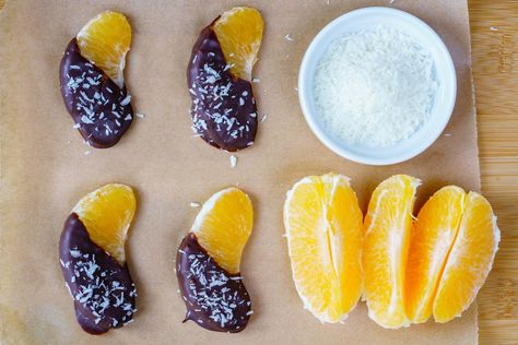 Make these Chocolate Orange Cuties with YOUR Cuties! - Something sweet to make with YOUR little cuties! And super healthy too :) Ingredients: 4-6 small oranges/mandarins 1 cup high quality dark chocolate 1 Tbsp coconut oil 1-2 Tbsps unsweetened dried coconut (I prefer " Let's do Organic" brand) Instructions: Peel the oranges and separate into... Healthy Kids Party Food, Low Sugar Snacks, Desiccated Coconut, Slow Cooker Desserts, Healthy Christmas, Holiday Snacks, Kids Party Food, Easy Meals For Kids, Healthy Holidays