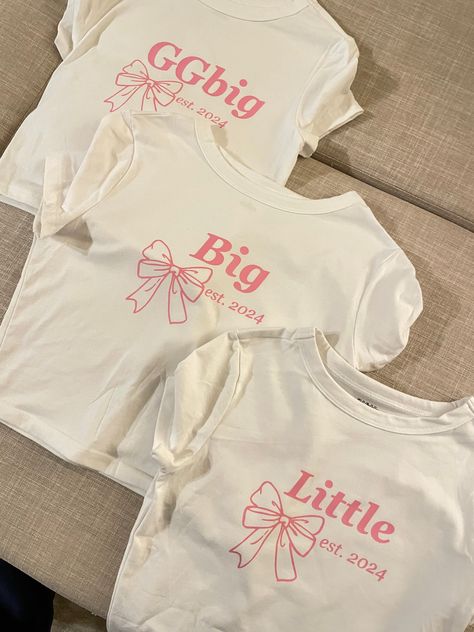 Super cute bow fam inspired sorority reveal baby tees Sorority Jersey Shirts, Big Little Sweatshirts, Bow Big Little Theme, Pink Big Little Reveal, Big And Little Shirts, Little Baskets, Country Big Little Reveal, Big And Little Themes, Sorority Sisterhood Ideas