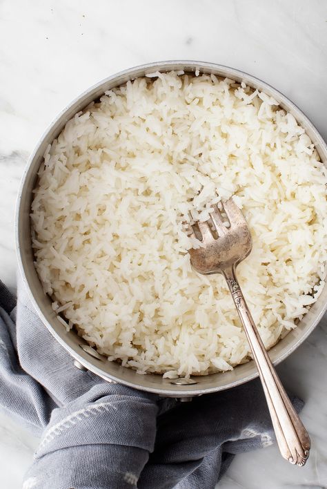 Learn how to cook perfect rice on the stove! This easy, 30-minute method yields tender, fluffy rice every time. Serve it as a side dish, or add it to stir fries, burritos, and more! | Love and Lemons #howto #rice #glutenfree #recipe Cook Jasmine Rice, Oven Baked Rice, Rice Pilaf Recipe, Rice On The Stove, Glutenfree Recipe, Pilaf Recipes, Cooking Jasmine Rice, Cooking Rice, Steamed White Rice