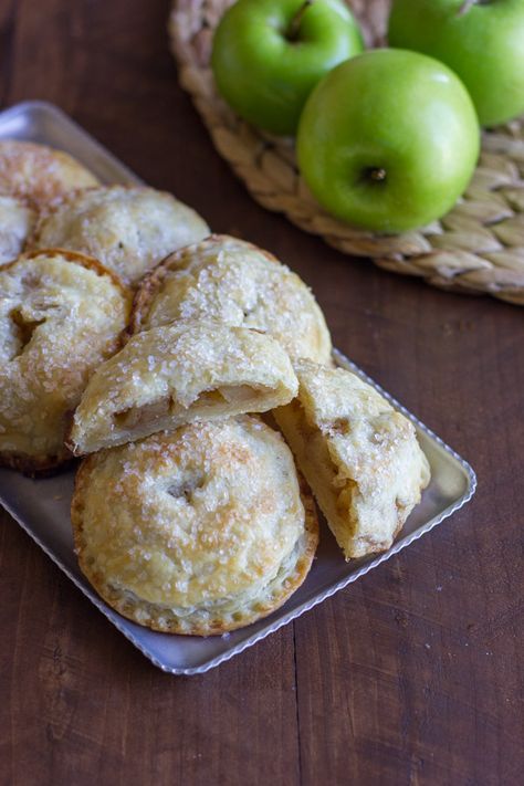 Apple Hand Pies - how to make these adorable apple hand pies plus the secret to making the FLAKIEST pie crust! Apple Crisps, Apple Hand Pies, Best Thanksgiving Recipes, Hand Pie, Dessert Aux Fruits, Pastry Pie, Mini Pies, Apple Pie Recipes, Hand Pies