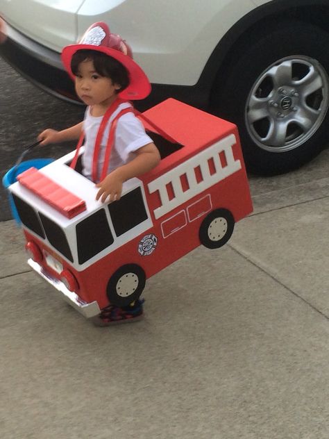 Homemade fire engine costume. Firetruck Costume, Fire Truck Costume, Gorilla Cart, Diy Fire Truck, Truck Halloween Costume, Wagon Halloween Costumes, Truck Costume, Toddler Boy Halloween Costumes, Kids Wagon