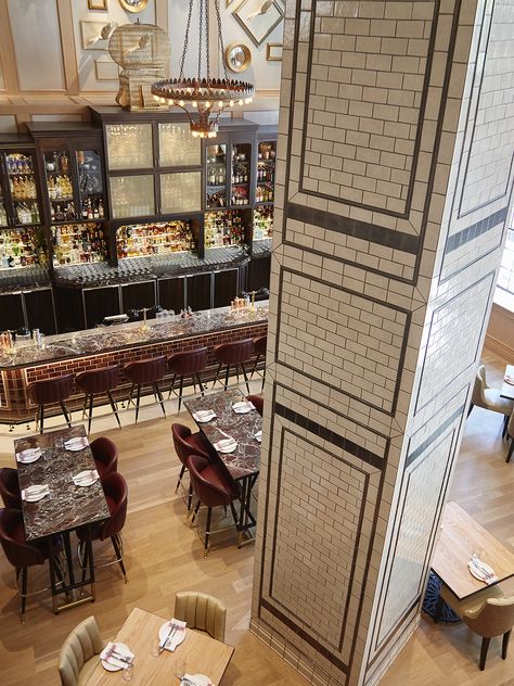 Nightingale by David Hawksworth | Studio Munge Tiled Column, Tile Column, Column Cladding, Food Court Design, Column Lighting, Pillar Design, Pub Design, Restaurant Lighting, Wood Chandelier