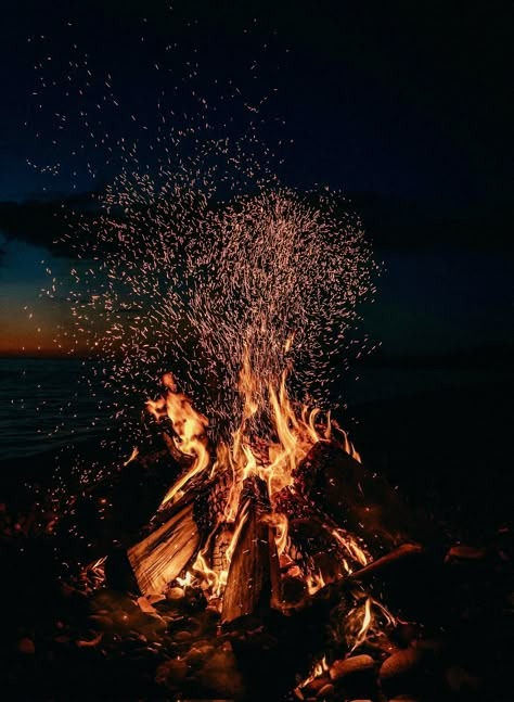 Photo by Hans Isaacson Bonfire With Friends, Beach Fire, Outer Banks Beach, Iphone Wallpaper Glitter, Warrior Cat Oc, Fire Image, Fire Photography, Original Iphone Wallpaper, Akashic Records