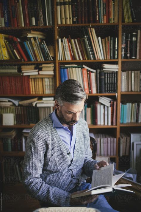 Man Reading A Book | Stocksy United Person Reading Book Reference, Dollars Money Wallpaper, Library Photo Shoot, Photography Guidelines, Man Reading, Writing Photos, Portrait Photography Men, Personal Branding Photoshoot, Reading A Book