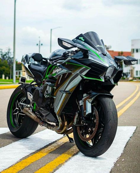 The Ninja H2® and Ninja H2® Carbon motorcycles bring the mind-bending power of Kawasaki's supercharged hypersport racer to the street. Boasting a powerful 998cc inline four-cylinder engine, state-of-the-art electronics, and the latest Brembo® brakes, the Ninja H2 and Ninja H2 Carbon amount to pure performance on the road

#kawasaki #kawasakibike #mostpowerfulbike #famousbike #sportsbike #higherccbike #ninja #h2 #superbike #worldfasterbike Kawasaki Ninja H2r Black, H2r Kawasaki, Kawasaki Ninja H2r, Ninja H2r, Ninja Bike, Kawasaki H2, Best Motorbike, Kawasaki Bikes, Super Bike