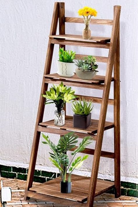 Immerse yourself in the perfect fusion of form and practicality. Crafted from high-quality materials, our shelves not only serve as stylish displays for your treasured belongings but also provide efficient storage solutions for a clutter-free environment. Wooden Plant Shelves, Wooden Display Shelves, Indoor Ladder, Shelves Plant, Shelf For Living Room, Ladder Bookshelf, Efficient Storage, Rustic Flower, Wooden Display