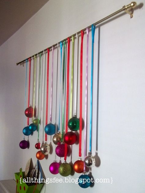 Ornament Hanging Ideas, Ornament Wall, Ornaments Hung From Ceiling, Ornament Display Ideas, Christmas Ornament Hanging From Ceiling, Christmas Balls Hanging From Ceiling, Christmas Balls Hanging From Window, Tree Branch Ornaments Hanging On The Wall, Hanging Baubles Window