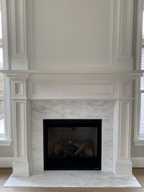 Quartz Around Fireplace, White Fireplace Remodel, Marble Hearth Fireplace, Fireplace With Marble Tile, White Quartz Fireplace, Marble Fireplace With Mantle, Fireplace Surround Brick, White Granite Fireplace, Marble Fireplace Hearth