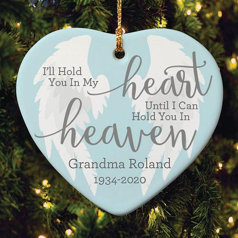 I'll Hold You In My Heart Personalized Ornament Our exclusive design features the phrase "I'll Hold You In My Heart Until I Can Hold You In Heaven". We personalize the bottom of the ornament with a name and memorial years.  What You Get      Ornament     Gold cord for hanging In Loving Memory Gifts, Heart Wings, Paper Crafts Card, Heart With Wings, Ornament Frame, Heart Ornament, Christmas Decorations Ornaments, Felt Hearts, Christmas Love