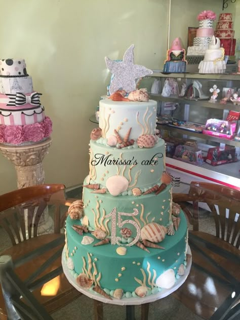 Under the sea quinceanera cake. Visit us Facebook.com/marissascake or www.marissascake.com Under The Sea Quinceanera Theme Decoration, Under The Sea Sweet 16 Decorations, Under The Sea Quinceanera Theme Dresses, Ariel Quinceanera Theme, Mermaid Quinceanera Theme, Little Mermaid Quinceanera Theme, Under The Sea Cake Ideas, Under The Sea Sweet 16, Under The Sea Quinceanera