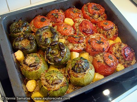 baked greek gemista stuffed tomatoes and vegetables recipe...Here's what's on for dinner tonight! Gemista Recipe, Greek Stuffed Tomatoes, Greek Stuffed Peppers, Cyprus Food, Cypriot Food, Stuffed Vegetables, Greece Food, Greek Dinners, Stuffed Tomatoes