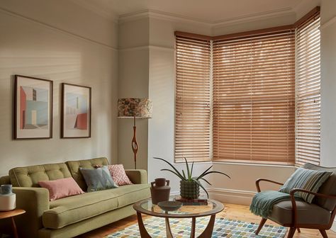 Mirage rich oak faux wood venetian blinds in living room bay window Bay Window Treatments Living Room, Venetian Blinds Living Room, Modern Bay Window Ideas, Wooden Blinds Living Room, Blinds Bay Window, Window With Blinds, Bay Window Curtain Ideas, Modern Bay Window, Victorian Bay Window