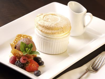 Classic French Lemon Rosemary Souffle Recipe Vanilla Souffle Recipes, Lemon Souffle, Chocolate Souffle Cake, Vanilla Souffle, French Dessert Recipes, Souffle Recipes, Souffle Dish, White Cake Recipe, Chocolate Souffle