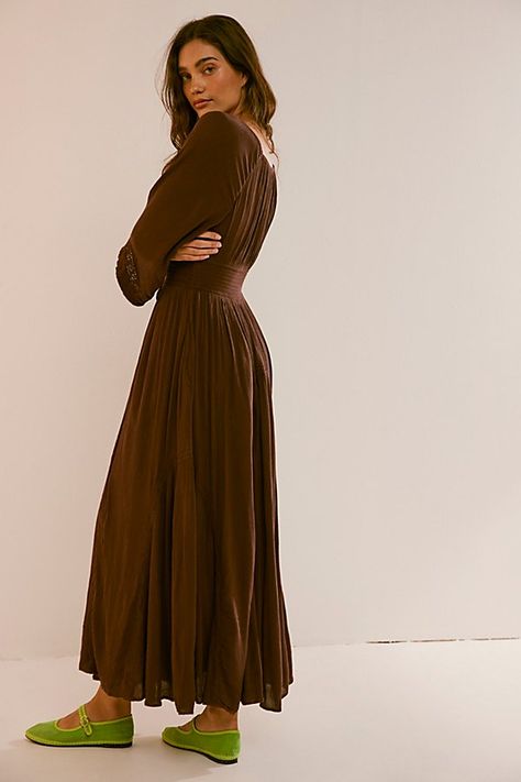 Romantic and ethereal, this sweet maxi from our free-est collection is a true versatile staple. **Fit:** Billowy throughout with cinched waist **Features:** V-neckline, smocked paneling at bodice, exaggerated sleeves, embroidered lace piecing at the skirt **Why We ❤ It:** Timeless with a sleek heel or laid back with simple flats, this style has endless ways to wear. | Dixie Maxi Dress by free-est at Free People in Brown, Size: XS Free People Slip Dress, Fall Maxi, Fall Family Photo Outfits, Exaggerated Sleeves, Fall Wedding Guest Dress, Dresses Casual Fall, Guest Attire, Romantic Outfit, Wedding Attire Guest