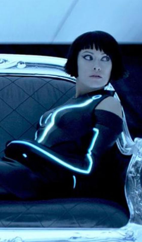 Olivia Wilde's Tron:Legacy costume looks better when she's sitting and turned. She was happy that a sequel was cancelled, saying, "Now I don't have to live on seaweed juice and tofu dust for 6 months to fit into a rubber suit." Olivia Wilde Tron Legacy, Olivia Wilde Tron, Tron Uprising, Nancy Allen, Kingdom Hearts Ii, Tron Legacy, Light Cycle, Disney Wiki, Disney Infinity