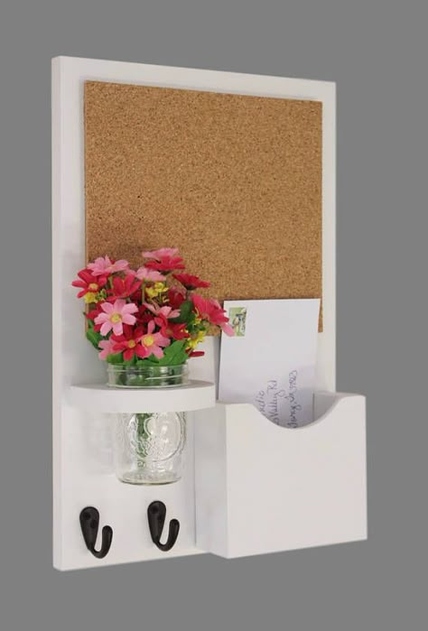 This beautiful cork organizer would work perfectly in an entry way or kitchen. It is the perfect place for grocery list, business cards and little bits of paper you don’t want to lose. It has two key hooks that can be used for keys or even dog leashes. The jar vase that is included can Diy Letter Holder, Key Organizer Wall, Key Holder Ideas, Mail And Key Holder, Advanced Woodworking Plans, Letter Organizer, Woodworking Shop Projects, Entryway Mudroom, Woodworking Plans Diy