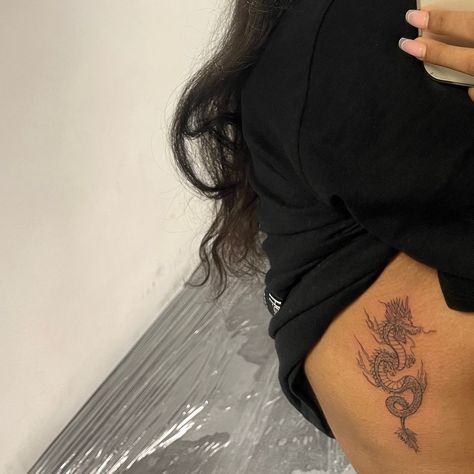 Small Dragon Rib Tattoo Woman, Dainty Chinese Dragon Tattoo, Rib Cage Dragon Tattoo, Rib Tattoos For Women Dragon, Dragon Tattoo For Women Ribs, Chinese Dragon Rib Tattoo, Dragon Tattoo Placement For Women, Rib Tattoo Dragon, Dragon Tattoo Ribcage