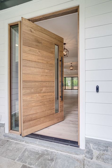 Our Beautiful Walnut Katti Pivot Door Design. This was for a project in Virginia on a home built by Stahl Homes. You may call us at any time to discuss your next project 719-425-4289 or visit us at pivotdoorcompany.com Pivot Doors Entry, Pivot Door Design, Pantry Door Ideas, Front Door Inspiration, House Front Door Design, Modern Entrance Door, Contemporary Front Doors, Pivot Door, Modern Entrance