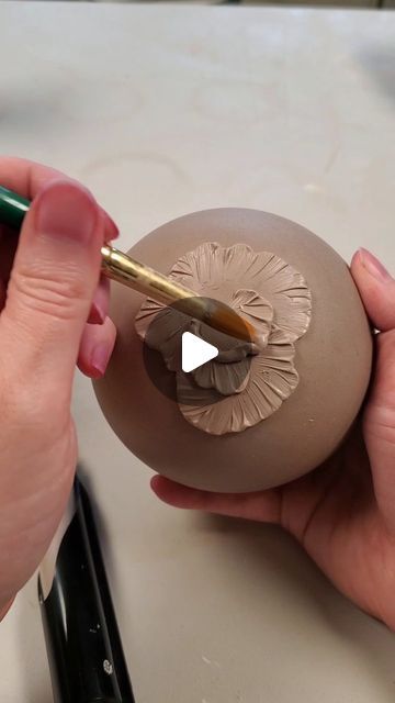 Lyndsey Roberts | Ceramic Arts on Instagram: "Full tutorial on my slip trailed flowers coming soon!  . . . #sliptrailing #sliptrailingpottery #sliptrailed #flowers #ceramicsaretrending #potteryartist #potteryarts #ceramicarts #ceramicartworks #processvideo #process #clay #claystagram #potterystudio #ceramicstudio #ceramics #studiotime #studiolife #ceramicartist #lyndseyroberts #lilacmoonceramics" Ceramic Flower Tutorial, Clay Slip Decoration, Slip Cast Ceramics, Ceramic Tutorials, Pottery Sprigs Clay, Pottery Slip Decoration, Slip Trailing Designs, Slip Casting Ceramics How To Make, Slip Trailing