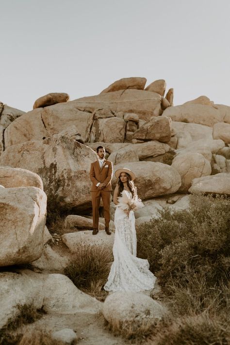 Desert wedding Boho wedding Joshua Tree elopement inspo terra cotta wedding bridal hat lack of color hat friar tux Joshua Tree National Park elopement desert engagement session bride and groom poses wedding photos boho wedding dress Burnt Orange Wedding Suit, Orange Wedding Suit, Joshua Tree Engagement Photos, Dreamers And Lovers, Dried Floral Bouquet, Joshua Tree Engagement, Joshua Tree Elopement, Joshua Tree Wedding, Boho Desert