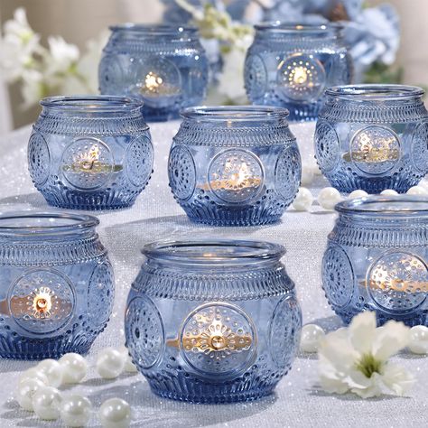 PRICES MAY VARY. Votive Candle Holders Bulk: Enhance your party ambiance with these elegantly crafted round votive candle holders, showcasing intricate sunflower relief patterns. Their mesmerizing design will undoubtedly add perfect finishing touch to your party table decorations. Candle Holders for Table Centerpiece: You will get 12 pack votive candle holders, measuring 2"(Cal) and 2"(H) and the waist Dia is approx 2.55". Let Tea Candle/ Small Votive or LED Tealights in these glass candle holde Candle Centerpieces For Home, Blue Bridal Shower Decorations, Blue Bridal Shower Themes, Blue Votive Candle Holders, Reception Table Centerpieces, Blue Candle Holders, Blue Candle, Something Blue Bridal, Blue Bridal Shower