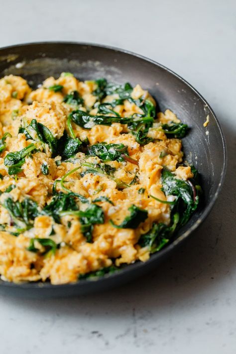 Cheesy Scrambled Eggs, cooked gently, mixed with Gruyère cheese, and folded together with sautéed greens. An easy twist on scrambled eggs! Sautéed Greens, Cheesy Scrambled Eggs, Breakfast Cheese, Dash Diet Recipes, Sauteed Greens, Recipe Breakfast, Egg Recipes For Breakfast, Eggs Recipe, Dash Diet