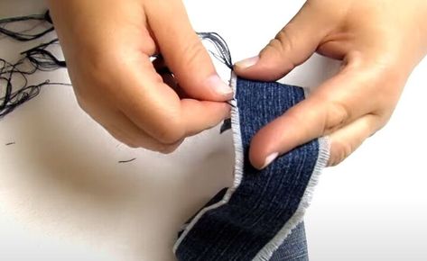 This is a guide to making DIY denim bracelets. Learn how to make denim bracelets and cuffs from old jeans with this easy step-by-step tutorial. Denim Gloves Diy, Jean Bracelets, Blue Denim Jeans With Button Cuffs, Denim Bracelets Diy Old Jeans, Diy Denim Earrings Old Jeans, Denim Cuff Bracelet Diy Tutorials, Diy Denim Bracelets, Denim Sewing Projects, Denim Cuff Bracelet