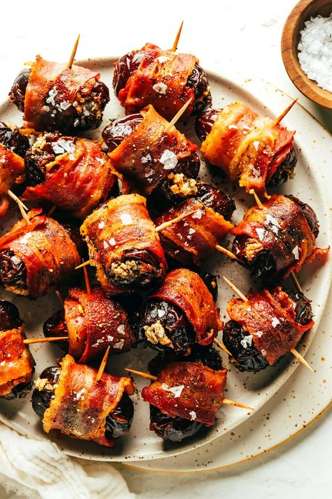 My favorite bacon-wrapped dates recipe is made with crispy bacon, tender Medjool dates, and stuffed with your choice of cheese (blue, feta, goat, cheddar, etc). A delicious appetizer that's easy to make and always a party favorite! | gimmesomeoven.com Bacon Dates, Wrapped Dates, Stuffed Dates, Bacon Wrapped Dates, Bacon In The Oven, Thanksgiving Dinner Menu, Party Snack Food, Gimme Some Oven, Date Recipes