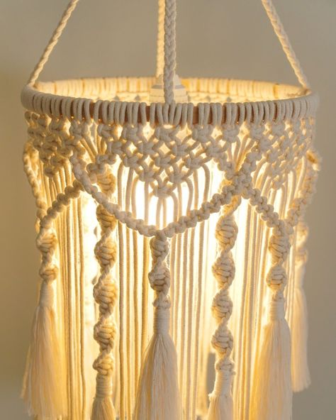 Ever come across that enchanting Macrame Hanging Lantern that just brings a smile to your face? 🌟💫 Found it recently and couldn't resist sharing the joy! It's more than just a pendant lamp – it's a beautifully crafted piece that seamlessly blends rustic and bohemian aesthetics into our living space. The intricate tassel chandeliers add an enchanting touch, casting a warm and welcoming glow. Perfect for our boho-inspired nursery, it effortlessly elevates our decor with its unique, handmade mac... Macrame Hanging Lantern, Woven Pendant Light, Earthy Chic, Boho Yarn, Bohemian Elements, Boho Space, Apartment Bedroom, Bohemian Handmade, Macrame Wall Art