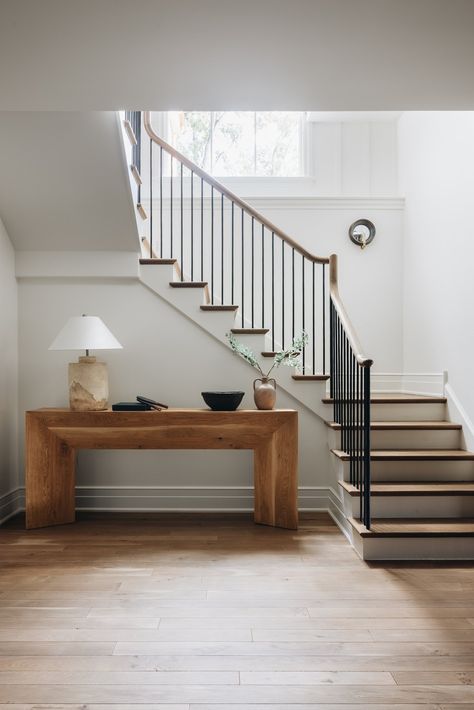 #BringingItHomeClient — KATE MARKER INTERIORS Studio Mcgee Staircase, Stair Styles, Rustic Staircase, White Staircase, Wrought Iron Staircase, Kate Marker Interiors, Wood Handrail, Brown Lamps, Console Table Styling