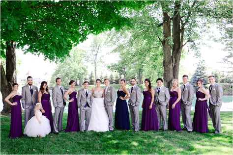 E+J: Like the light grey suits for the groomsmen (but don't like the bridesmaid dresses). Flower girl dress is awesome. Plum Navy And Grey Wedding, Purple Gray Wedding, Dark Grey Groomsmen, Purple And Gray Wedding, Lesbian Wedding Outfits, Gray Wedding Party, Grey Groomsmen, Grey Wedding Theme, Lilac Bridesmaid