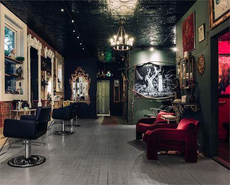 Dark Salon Interior Design, Goth Salon Ideas, Dark Moody Salon, Black Wall Salon Decor, Dark Hair Salon Decor, Dark Academia Salon, Dark Moody Salon Suite, Gothic Nail Salon Decor, Maximalist Hair Salon Decor