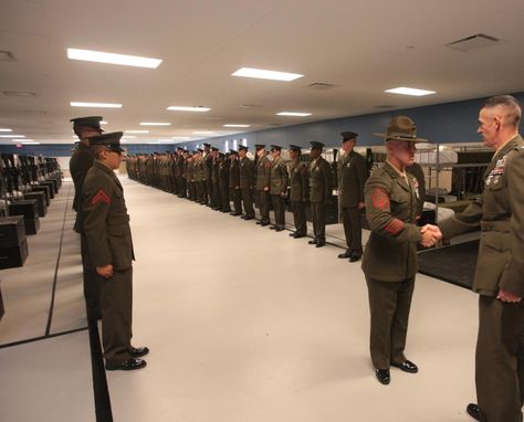 Staff Sgt. Mark Mlachak, senior drill instructor for Platoon 3069, shakes hands with Lt. Col. James Shelton, commanding officer of 3rd Recruit Training Battalion, following his inspection of Lima Company's new Marines on Sept. 4, 2013, on Parris Island, S.C. New Marines must pass the battalion commander's inspection to graduate recruit training. Mlachak, 30, is from Painesville, Ohio. Lima Company is scheduled to graduate Sept. 6, 2013. Parris Island has been the site of Marine Corps recruit tra Painesville Ohio, Marine Graduation, Marine Corps Bootcamp, Marine Officer, Drill Instructor, Parris Island, Staff Sergeant, Tactical Survival, Us Marine Corps