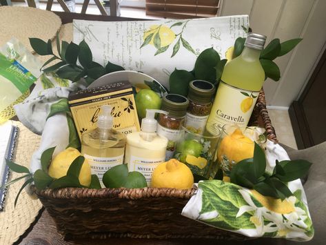 Bridal Shower Gift Basket • Lemon theme • Williams Sonoma Meyer Lemon Apron • Williams Sonoma Meyer Lemon Soap and Lotion • Limencello • Placemats • Trader Joe’s Cookies • Lemon Themed Gift Basket Ideas, Lemon Theme Gift Basket, Lemon Gift Basket Ideas, Bridal Shower Kitchen Theme, Lemon Gifts, Bridal Shower Gift Basket, Client Gift Baskets, Diy Mother's Day Gift Basket, Tricky Tray