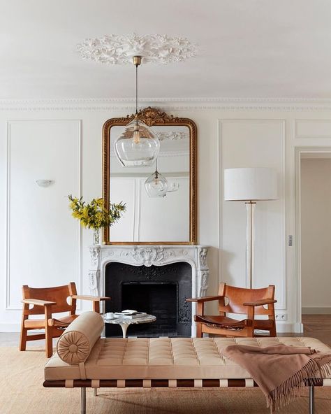 Parisian mirror in Paris apartment with fireplace and beige leather chairs via @abkasha -- 7 Parisian Style Mirrors to Say “Oui” to Parisian Living Room, Parisian Apartment Decor, Chic Apartment Decor, Living Room Decor Country, Cute Living Room, Parisian Interior, Deco Studio, Apartment Chic, French Country Living Room