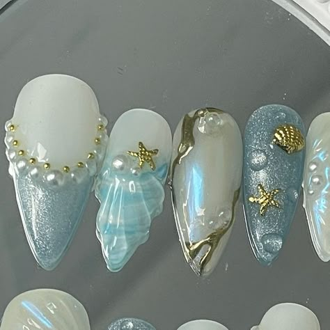 Press On Nails Australia | Custom Made To Order on Instagram: "It’s a beach day somewhere // OCEAN FANTASY SET 🌊☀️ Adore how refreshing this set is (Pictured Long Stiletto)   • •  #presson #pressonnails #naildesign #nailart #nailinspo #nailinspiration #nailtech #pressonnailbusiness #pressonsets #nailartist #nailsaustralia #stickonnails  #customnails #custompressonnails #miffynails #y2k #prettynails #cutenails #kessiistudio #customnails #custompresson #naildesigns #y2krings #sanrionails #coquettenails #bownails#3Djellygel #australiapressons #australianails #seashellnails #oceannails" Nails Ocean Design, Seahorse Nails, Ocean Nails Designs, Sea Inspired Nails, Nails Australia, Ocean Nails, Seashell Nails, Beachy Nails, Long Stiletto