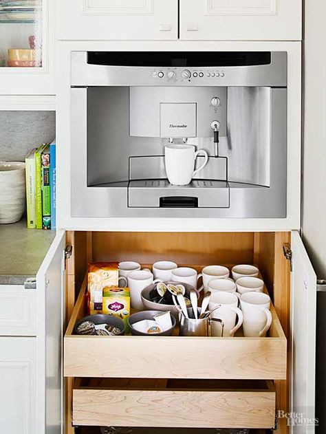 Make mornings easier with an all-in-one coffee station. Dedicate a pullout drawer next to your coffeemaker to holding filters, coffee beans, and travel mugs, so brewing a fresh pot is a one-step task./ Kitchen Ideas For Storage, Coffee Station Ideas, Coffee Station Kitchen, Extra Kitchen Storage, Homes Kitchen, Ideas For Storage, Coffee Stations, Tea Station, Kitchen Tour