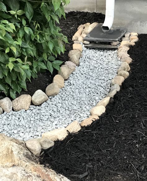 Slate Garden Edging, Gutter Drainage Ideas River Rocks, River Rock Downspout Drainage, Rock Downspout Drainage, Rock French Drain, Rock Drainage Path, Downspout Drainage Ideas River Rocks, Delaware River Rock Landscaping, Rainscape Ideas