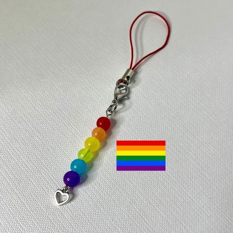 🌈Happy Pride Month🌈 Celebrate Pride Month with our exclusive "Pinky Pride" collection from Pretty in Pinky! Our handcrafted beaded charms are vibrant tributes to the diverse spectrum of the LGBTQ+ community. Show your pride and support with these beautiful, symbolic accessories. Each charm represents a different pride flag: 🌈 Gay Pride Flag: A symbol of LGBTQ+ unity and pride. The rainbow colors represent diversity within the community. 🖤 Philadelphia Pride Flag: Includes black and brown ... Subtle Pride Jewelry, Pride Jewelry Diy, Pride Crafts, Diy Keychains, Beaded Diy, Beaded Charms, Pride Art, Giveaway Alert, Pride Jewellery