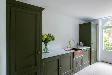 MYLANDS on Instagram: “Green, Green, Green....💚 Cabinetry surrounding stunning brass butlers sink is painted in Messel No.39. Great combination @middletonbespoke…” Exterior Masonry Paint, Olive Green Kitchen, Olive Green Paints, Kitchen Extensions, Dark Green Kitchen, Colourful Kitchen, Square Kitchen, Mews House, Green Kitchen Cabinets